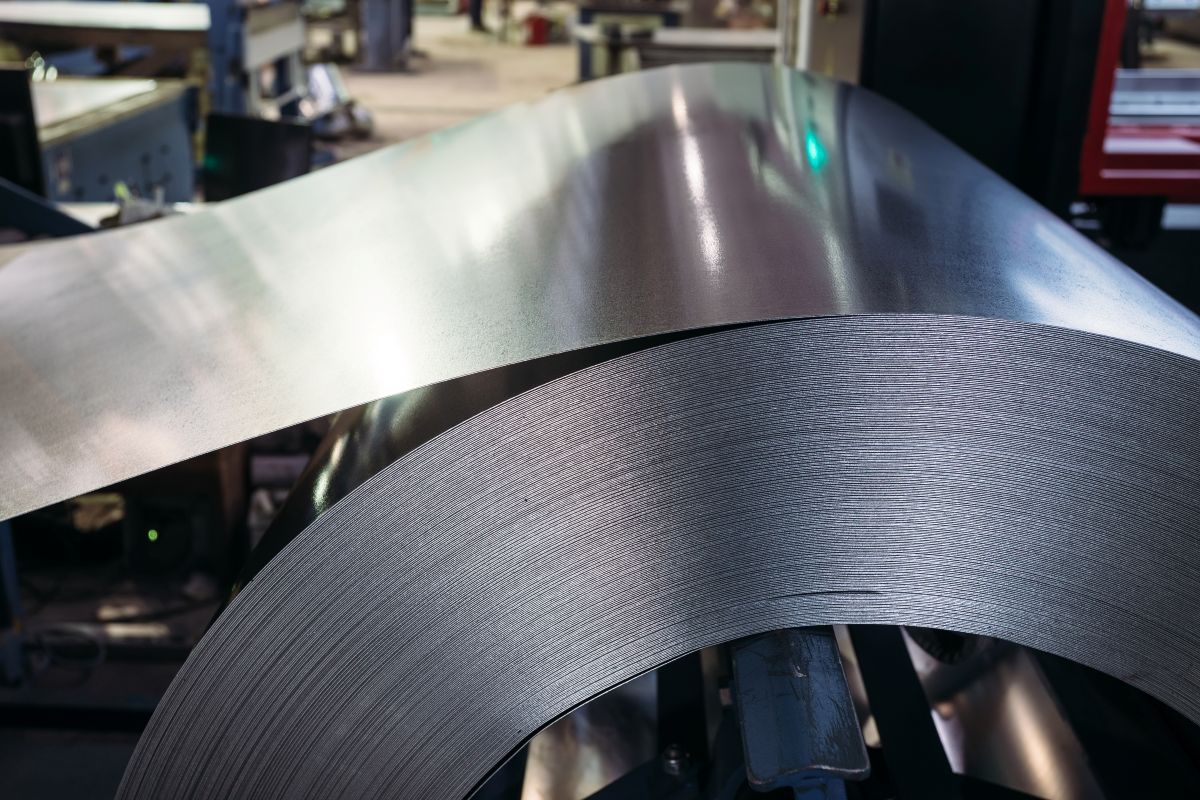 Roll of galvanized steel sheet. Close up view, selective focus